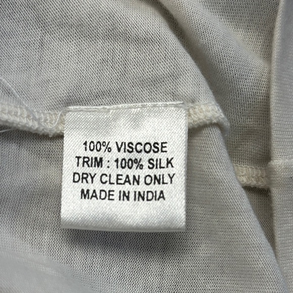 Saivana White Tank Top with Bib Collar and Asymmetrical Cut Out Design - Picture 8 of 8